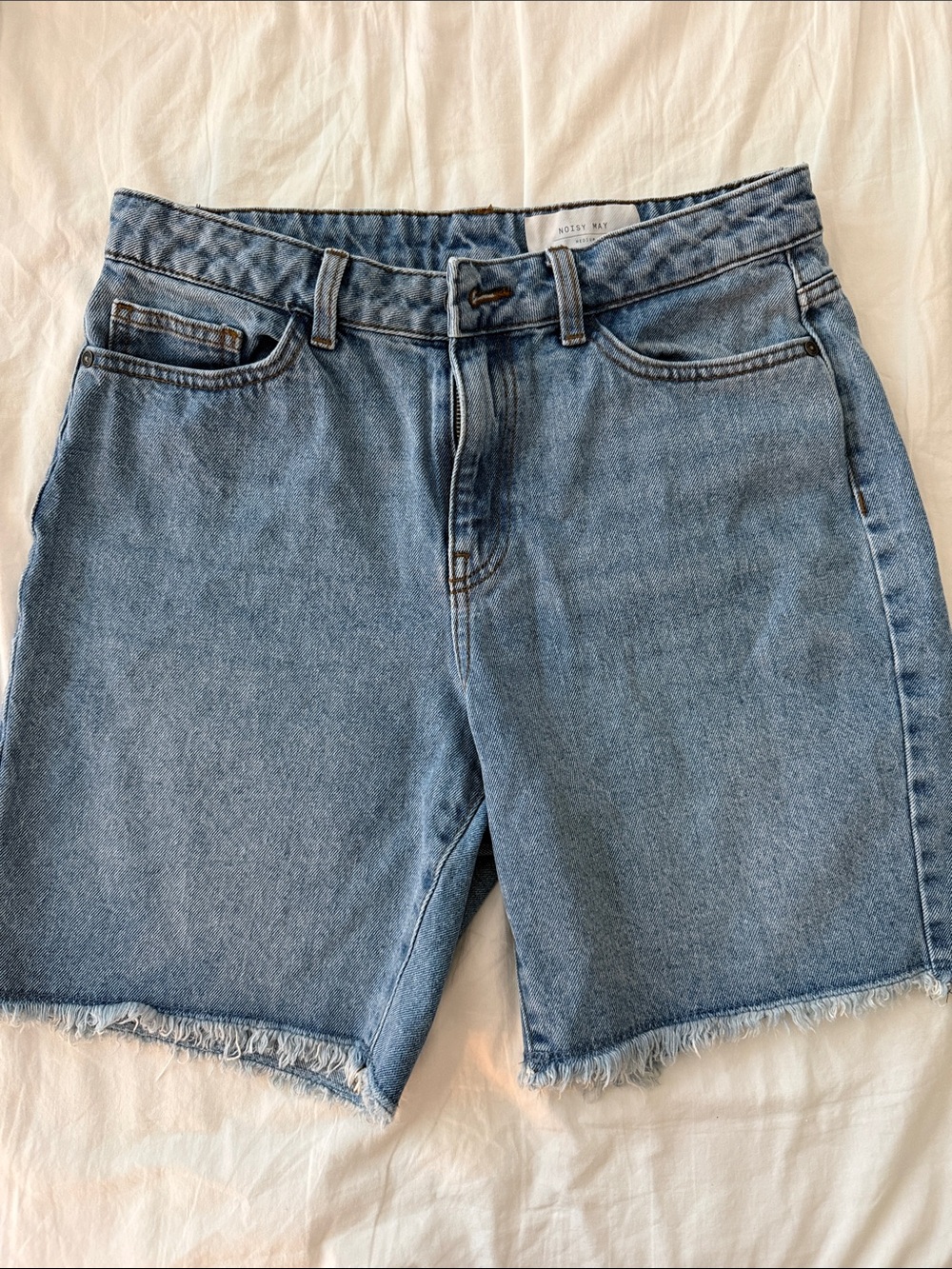 Noisy May Mid-Rise Light Blue Denim Frayed Hem Shorts